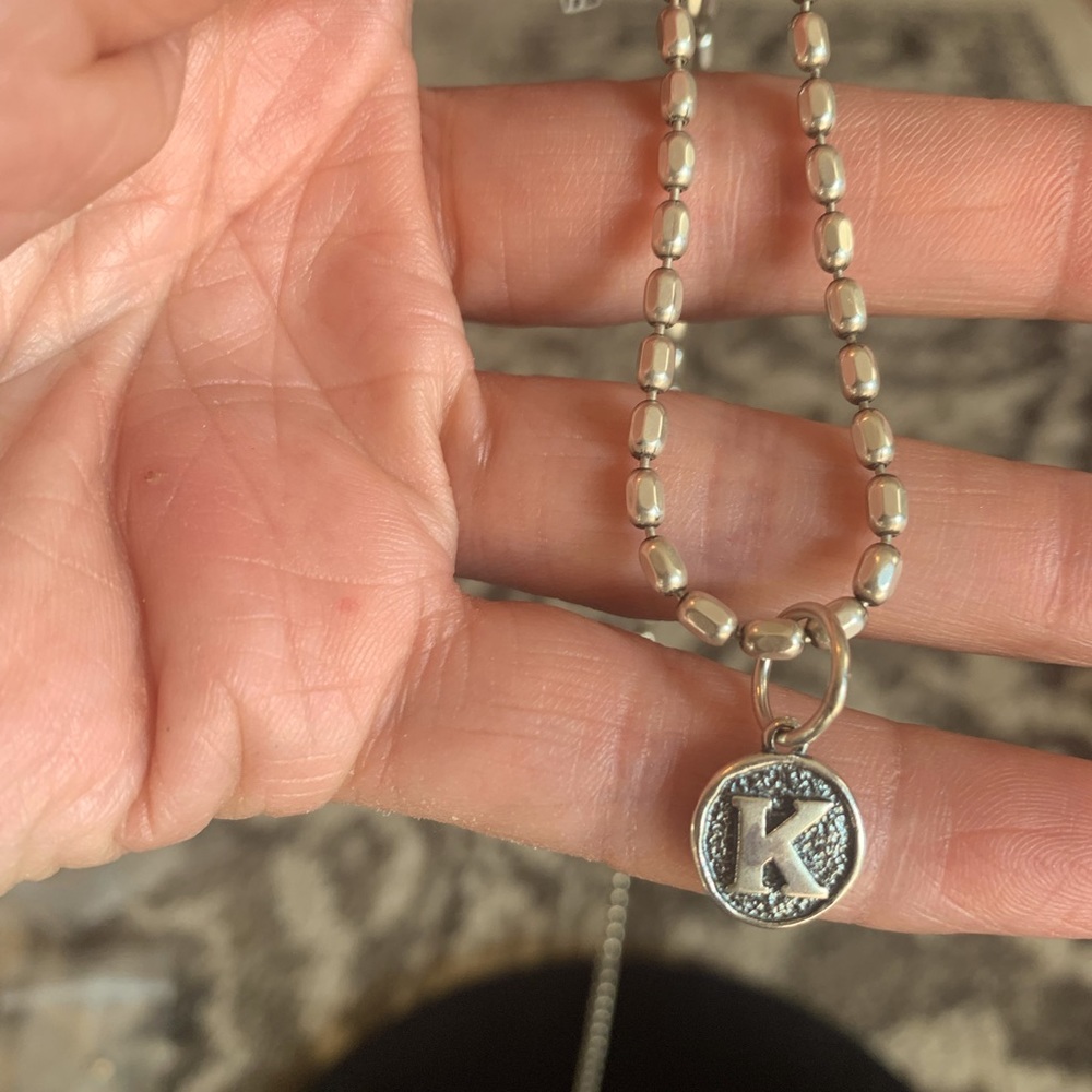 Sterling silver letter pendant “K”
